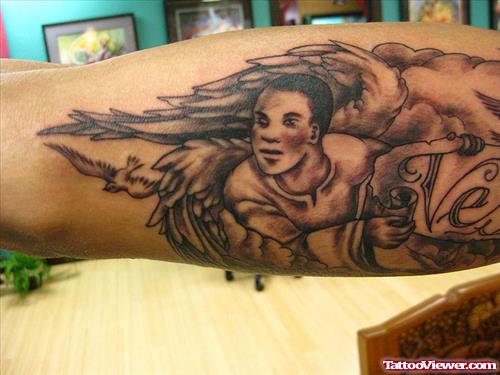 Awesome Grey Ink Angel Tattoo On Bicep