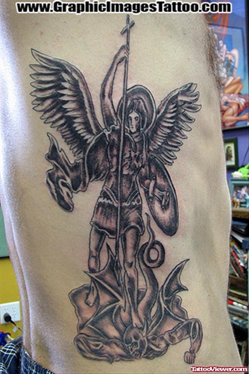 Archangel Killing Demon Tattoo On Side Rib