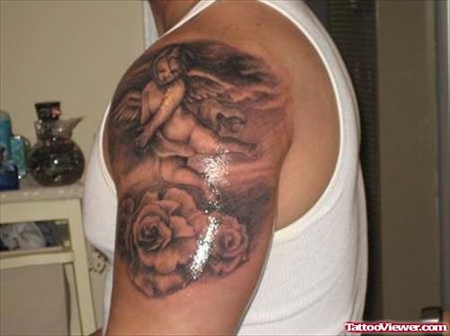 Rose Flowers And Flying Cherub Angel Tattoo On Shoulder