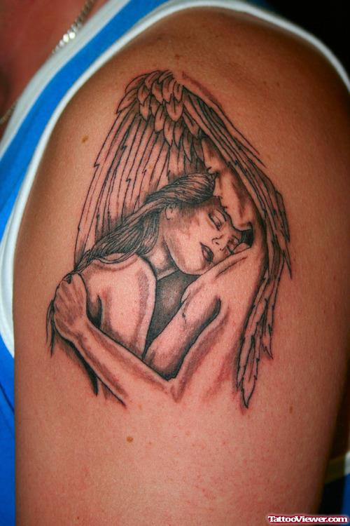 Angels Love Grey Ink Tattoo On Left shoulder