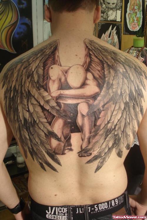 Sad Male Angel Grey Ink Tattoo On Back
