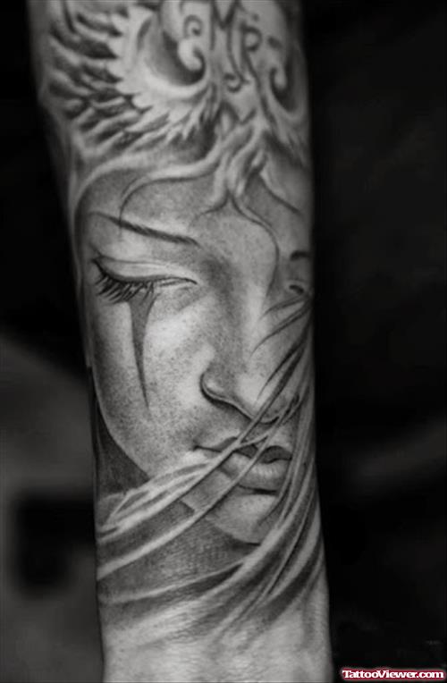 Angel Face Tattoo On Arm