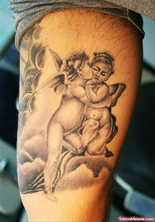 Grey Ink Angels Kissing Tattoo On Bicep