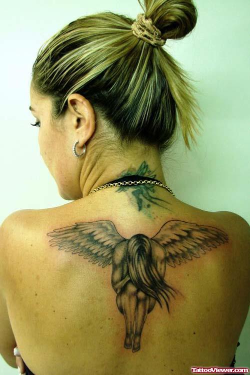 Fallen Angel Tattoo On Girl Upperback
