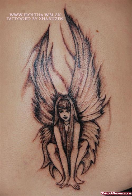 Sitting Angel Girl Grey Ink Tattoo