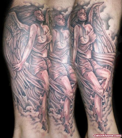 Grey Ink Angel Tattoo On Leg