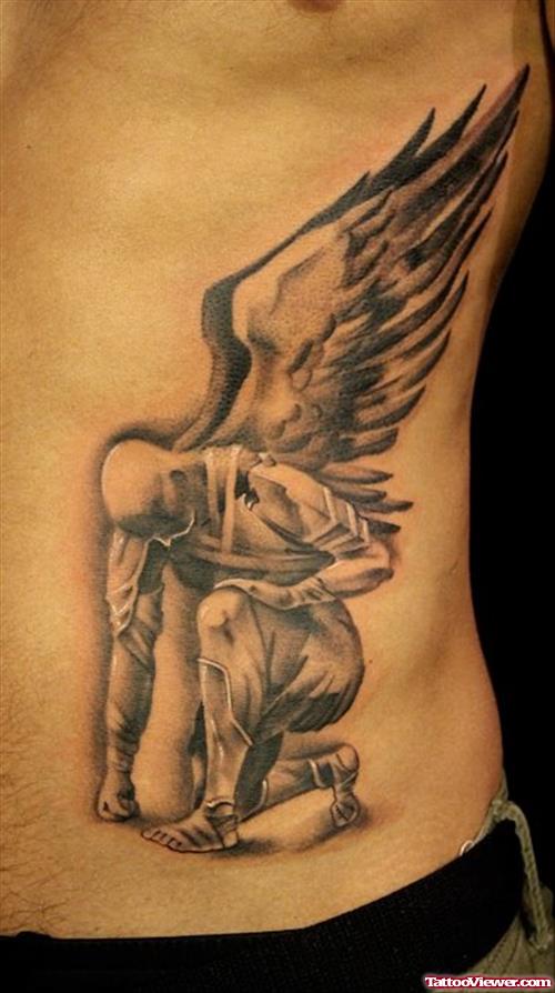 Fallen Angel Tattoo On Man Side Rib