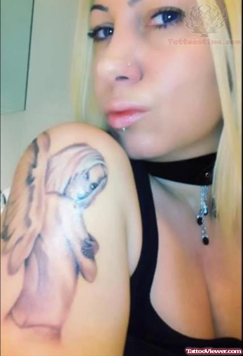 Angel Tattoo On Right Bicep