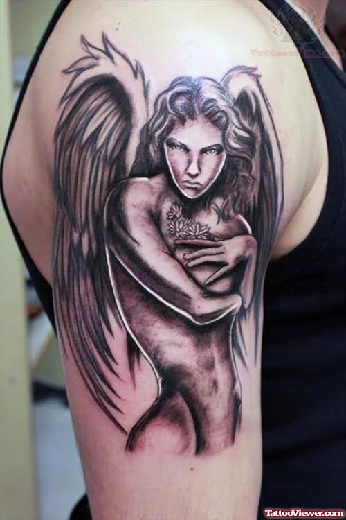 Grey Ink Angel Tattoo On Men Biceps