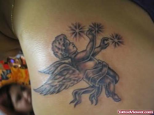 Baby Angel Playing Tattoo