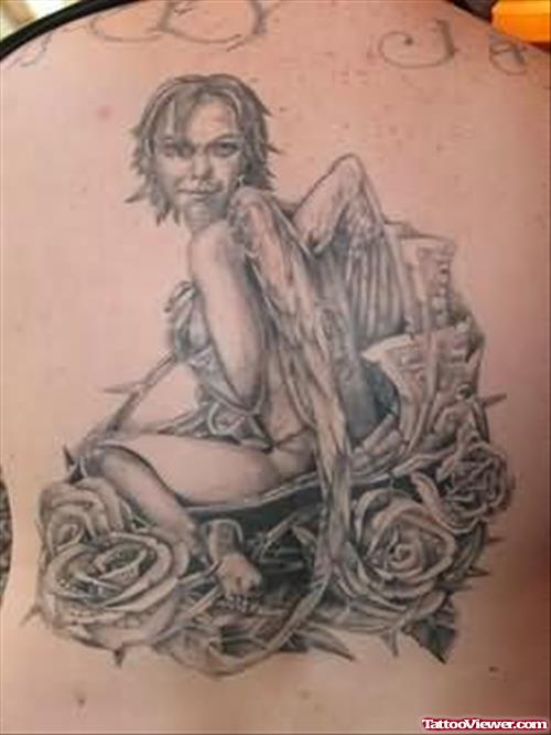 Angel Sitting Tattoo Design
