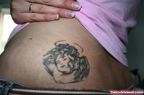Baby Angel Tattoo On Waist