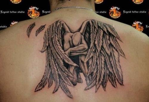 Grey Ink Fallen Angel Tattoo On Man Upperback