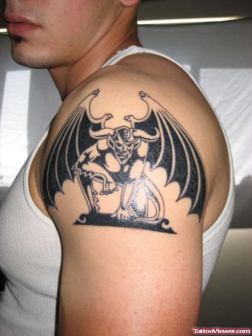 Grey Ink Gargoyle Animated Tattoo On Left Shoulder