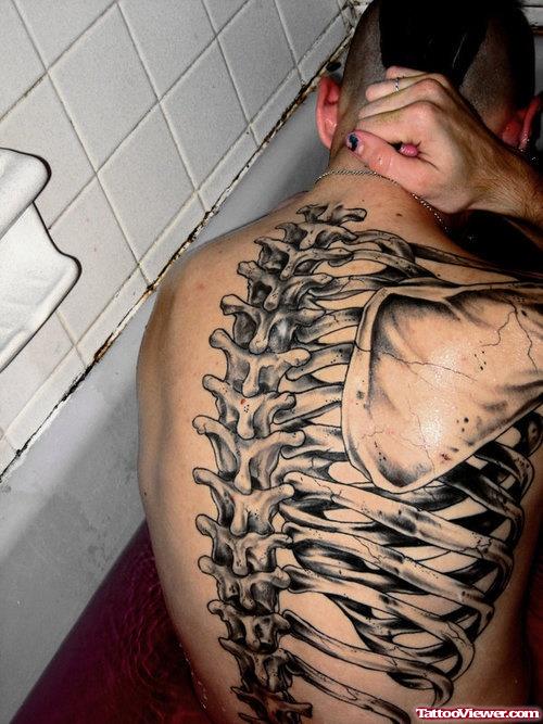Grey Ink Skeleton Animated Tattoo On Back