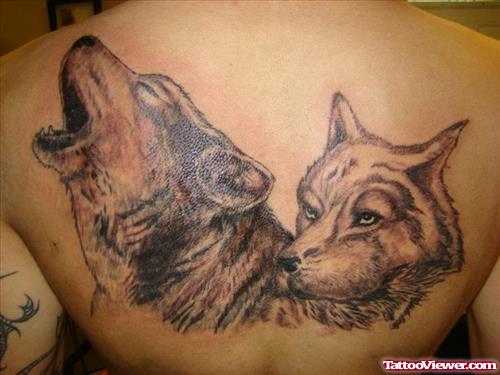 Animated Wolf Heads Tattoos On Back
