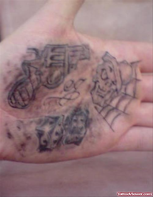 Grey Ink Gun And Spider Web Animated Tattoo On Left Hand