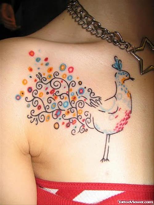 Beautiful Colored Animated Tattoo On Collarbone
