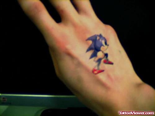 Colored Sonic Animated Tattoo On Hand