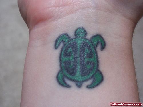 Small Animated Turtle Tattoo On Wrist