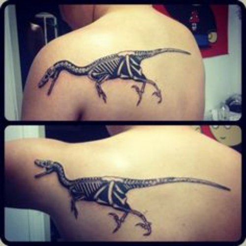 Animated Dinosaur Tattoo On Back