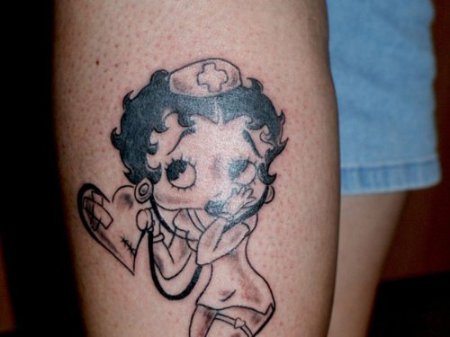 Grey Ink Betty Boop Animated Tattoo On Leg