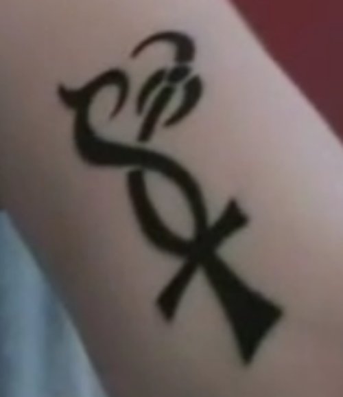 Black Ink Ankh Tattoo On Arm