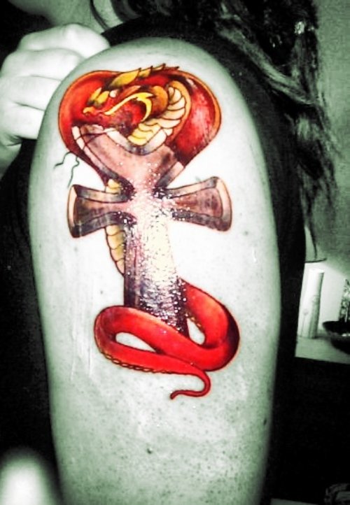 Red Snake And Ankh Tattoo On Left Shoulder