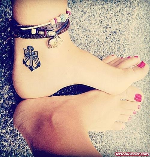 Bow Anchor Tattoo On Left Ankle