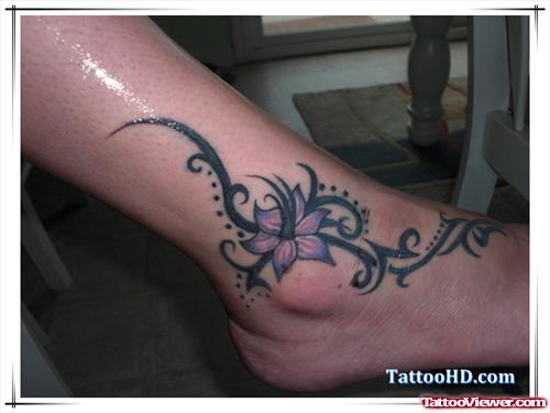 Tribal And Flower Ankle Tattoo
