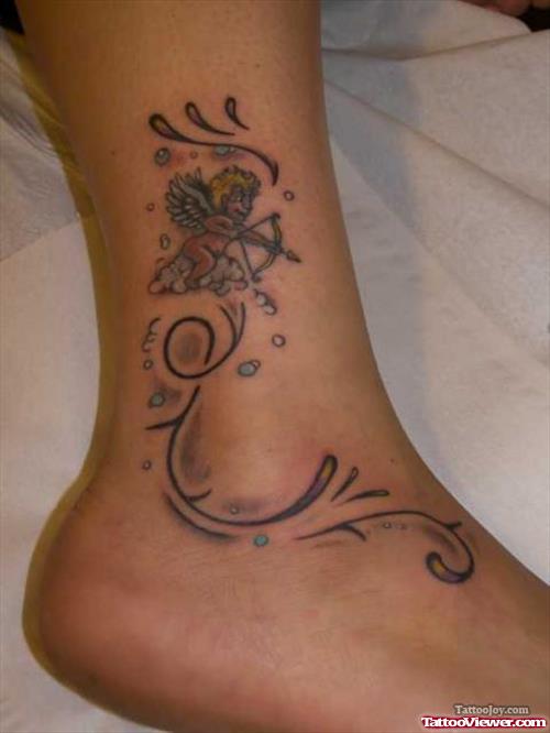 Grey Ink Swirl Tattoo On Ankle