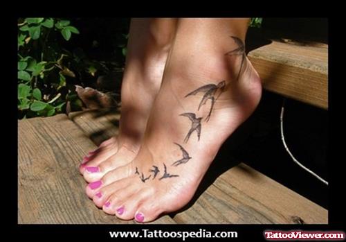 Grey Ink Flying Birds Ankle Tattoo