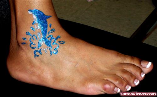 Blue Ink Ankle Tattoo On Right Foot