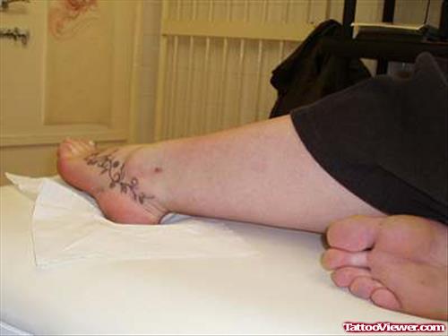 Grey Ink Leaves Ankle Tattoo