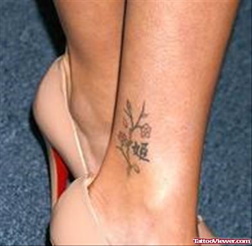 Amazing Flowers And Kanji Symbol Ankle Tattoo