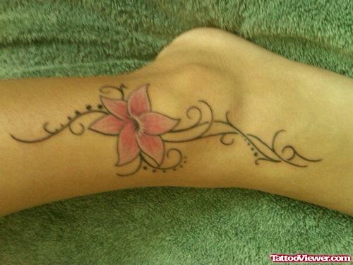 Tribal And Pink Flower Tattoo On ankle