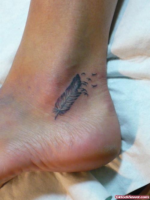 Grey Ink Feather And Flying Birds Ankle Tattoo