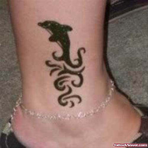Tribal And Dolphin Ankle Tattoo