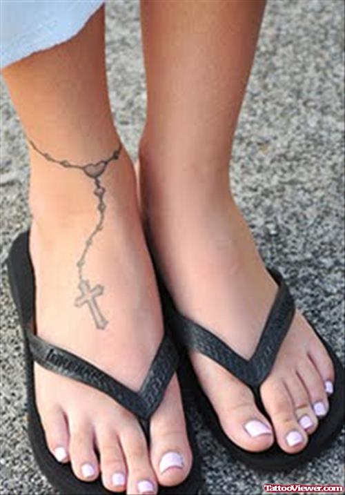 Grey Ink Cross Rosary Tattoo On Right Ankle