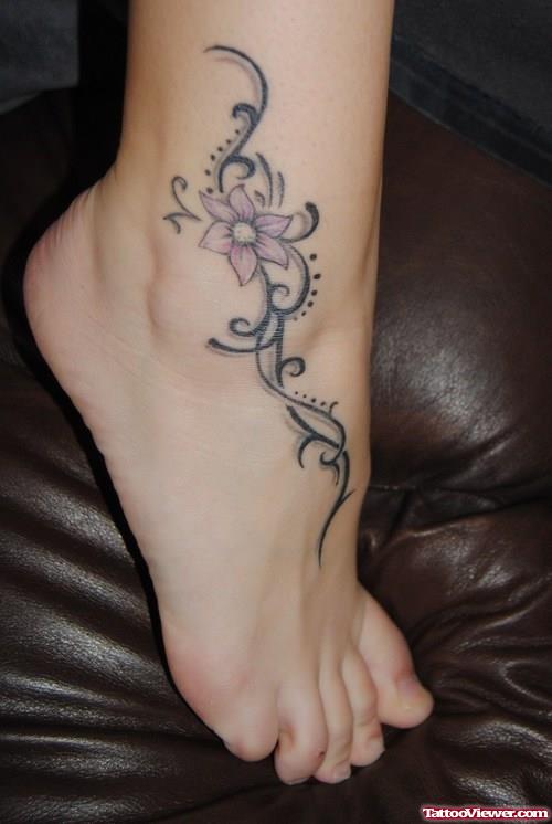 Attractive Tribal Flower Ankle Tattoo