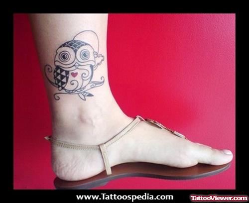 Grey Ink Owl Tattoo On Ankle