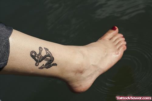 Grey Ink Anchor and Bird Ankle Tattoo