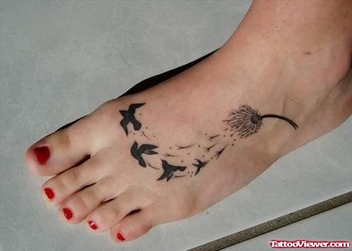 Black Flying Birds And Sandelion Puff Ankle Tattoo