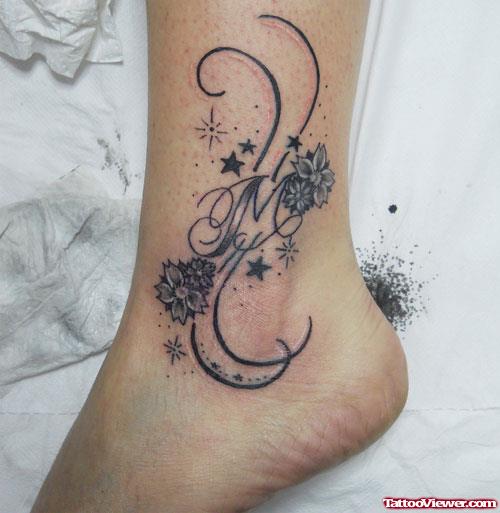 Awesome Grey Ink Flowers Tattoos On Ankle Tattoo