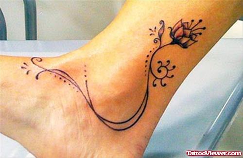 Attractive Grey Ink Flower Ankle Tattoo