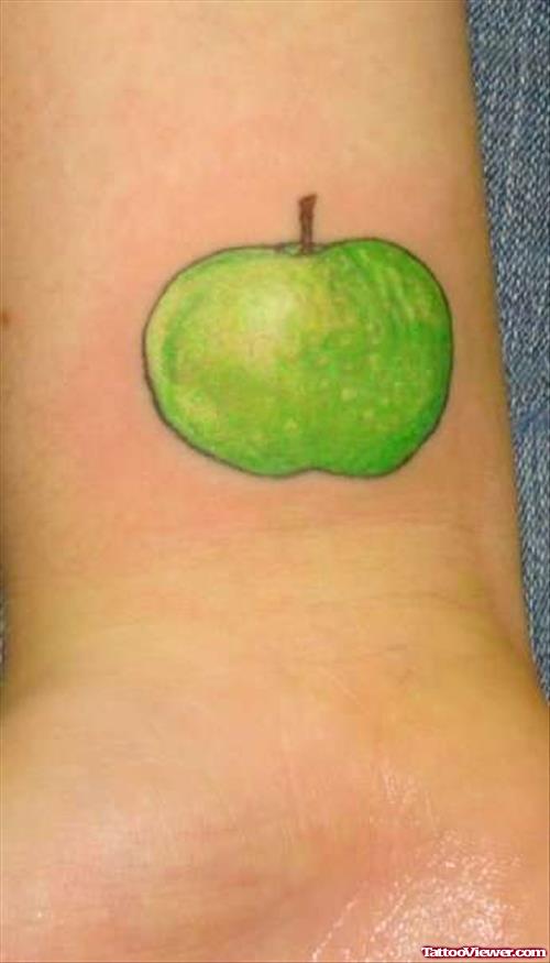 Green Apple Tattoo On Wrist