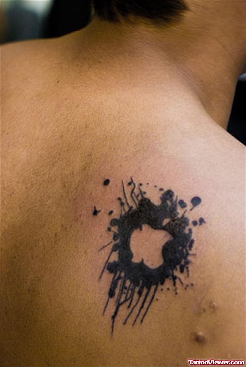 Black Ink Apple Tattoo On Right Back Shoulder