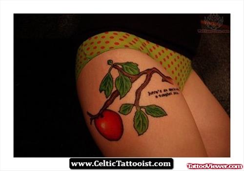 Red Ink Apple Tattoo On Right Thigh
