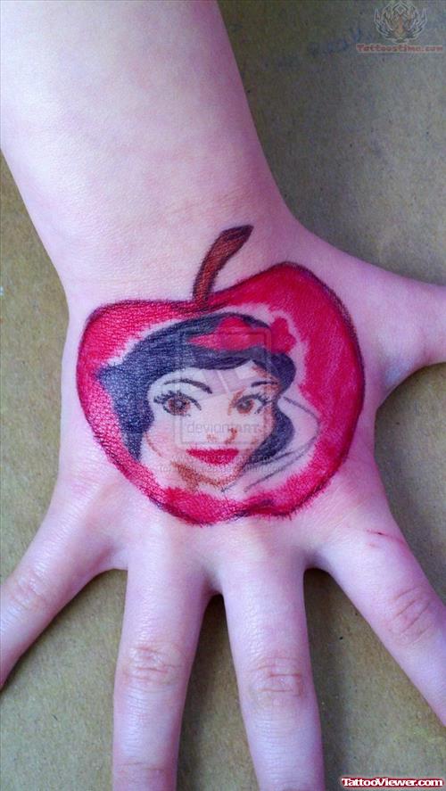 Girl Face in Apple Tattoo On Right Hand