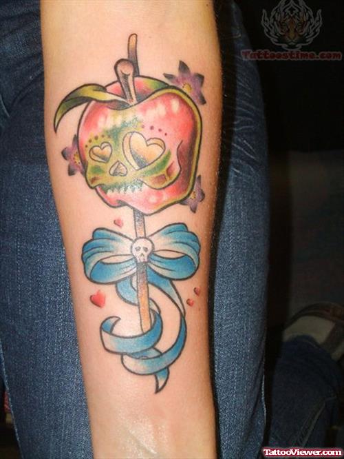 Skull Candy Apple Tattoo On Arm